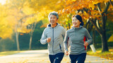 シニアのフィットネス、一緒に笑顔でジョギングをする日本人の夫婦