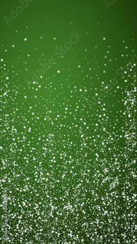 Falling snowflakes christmas background. Subtle flying snow flakes and stars on christmas green background. Beautifully falling snowflakes overlay. Vertical vector illustration.
