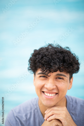 Close up smiling handsome young man
