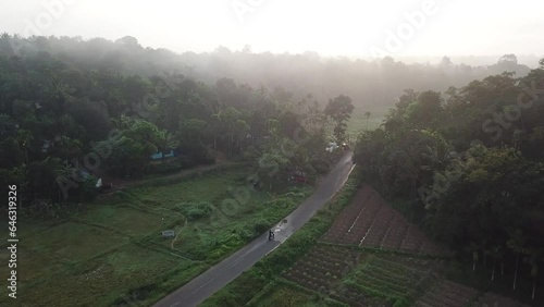 Following a bike early morning in Kerala, India