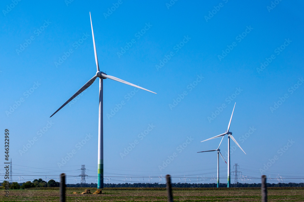 windmill along the autobahn on a sunny day. Energy Saving