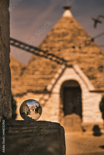 Trullo of Alberobello in the crystal ball,Puglia,Italy photo
