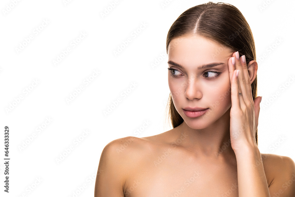 Beauty portrait of a smiling woman looking at camera on a white background Beauty portrait of a smiling woman looking at camera on a white background