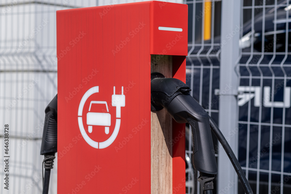 Charging an electric car battery, new innovative technology EV Electrical vehicle. Charging