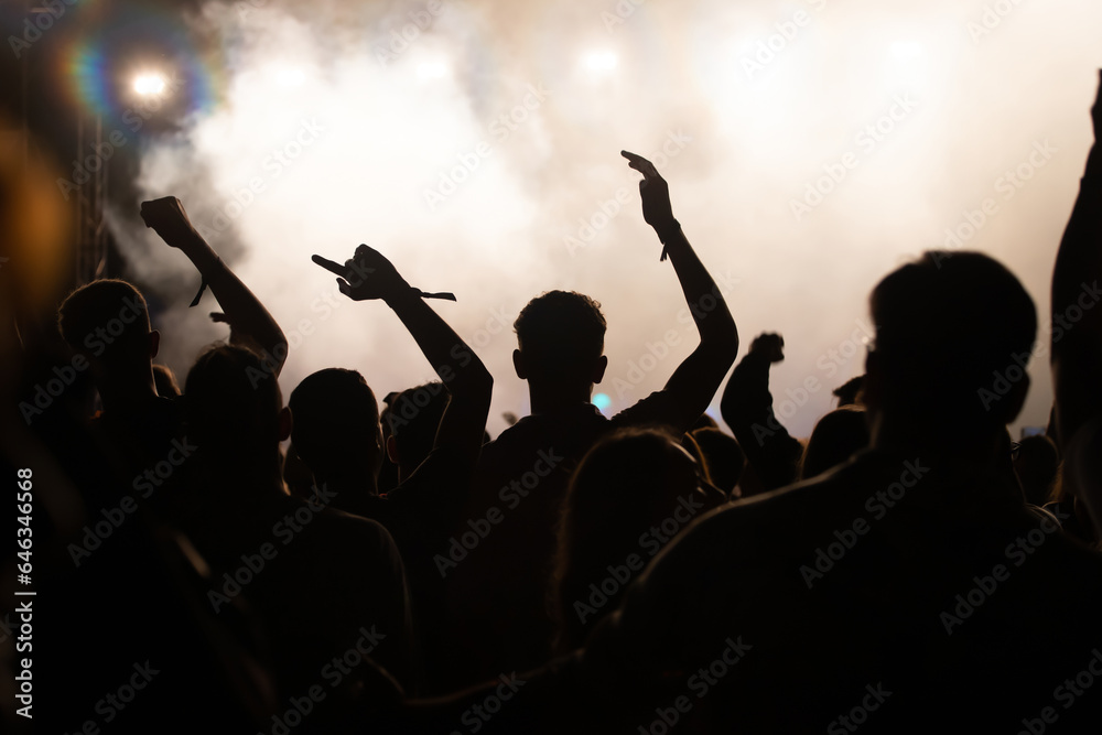 Abstract photo of crowd at concert and blurred stage lights. Abstract photo of crowd at concert and blurred stage lights.