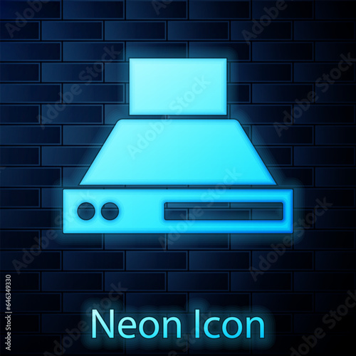 Glowing neon Kitchen extractor fan icon isolated on brick wall background. Cooker hood. Kitchen exhaust. Household appliance. Vector