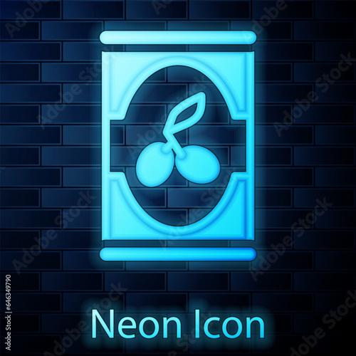 Glowing neon Olives in can icon isolated on brick wall background. Concept of canned food. Vector