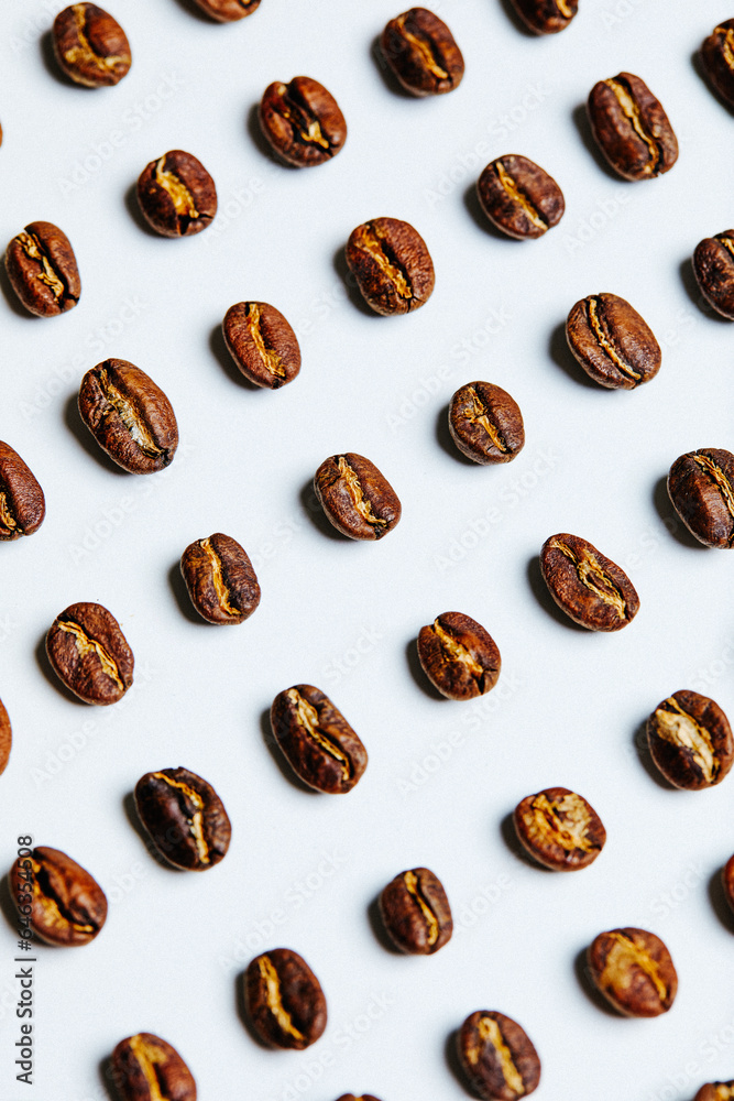 Coffee beans on white background - stock photo Coffee beans on white background - stock photo
