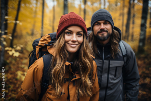 Portrait of a young couple in the autumn forest