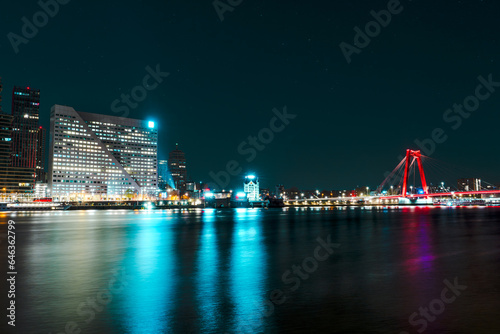 Immersed in the Timeless Beauty of Rotterdam's Nightfall, Where Skyscrapers Sparkle Amidst Reflections on the Water © Ilja