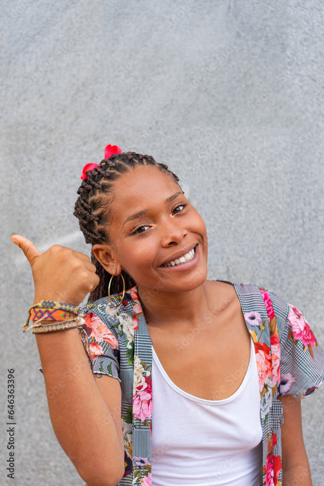 cheerful young Afro woman taking selfie outside on the street. cheerful young Afro woman taking selfie outside on the street.