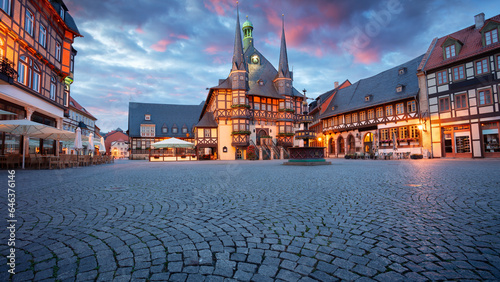 Wernigerode, Germany. Cityscape image of historical downtown of Wernigerode, Germany with Old Town Hall at summer sunrise. photo