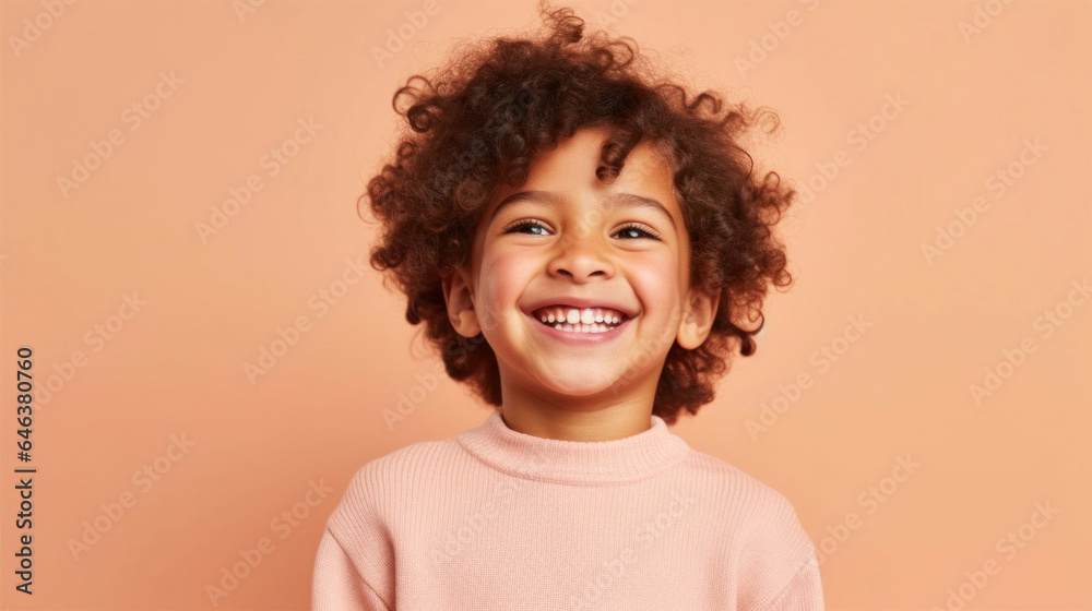 Little boy in neutral attire smiles on beige studio background. Generative AI Little boy in neutral attire smiles on beige studio background. Generative AI