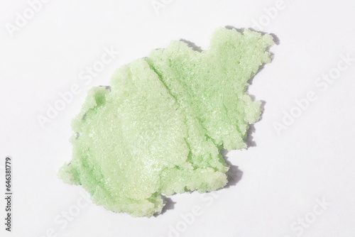 Matcha, green tea or seaweed scrub swatch on white background. Face, body or lip product.