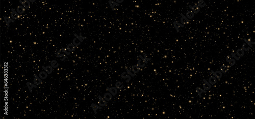 Festive vector background with gold glitter and confetti for Christmas celebration. Black background with glowing golden particles.