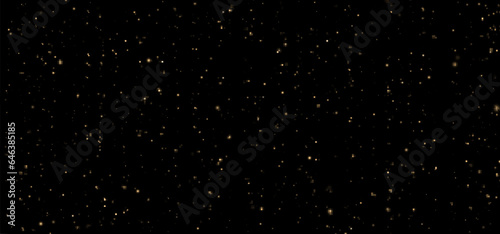 Festive vector background with gold glitter and confetti for Christmas celebration. Black background with glowing golden particles.
