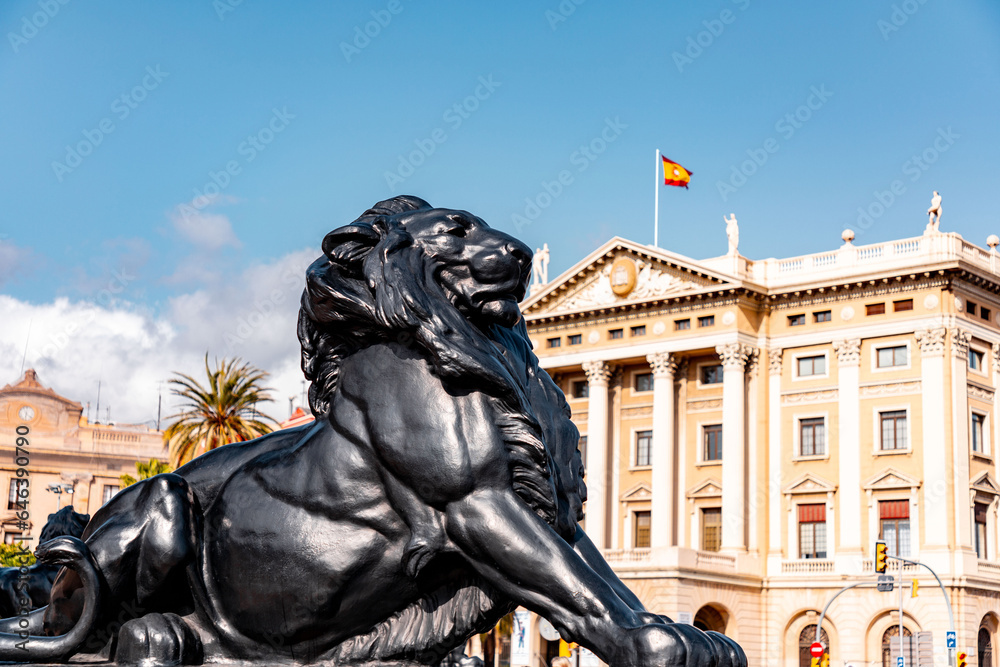 Obraz premium Placa Portal de la Pau is a busy city square at the lower end of La Rambla, Barcelona, Spain.