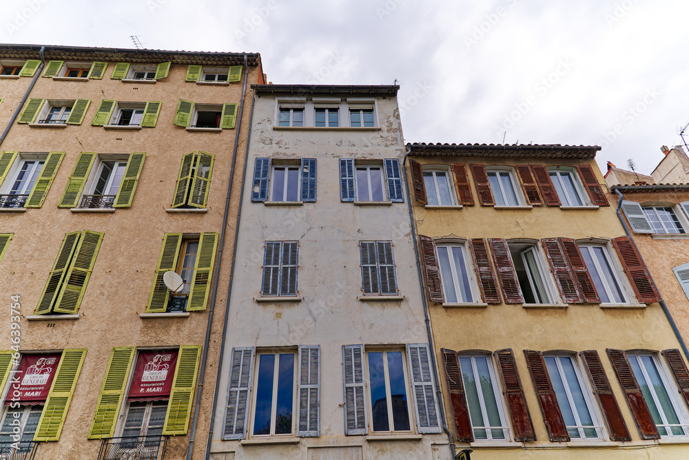 Facades of residential houses at French City of Toulon on a cloudy late spring day. Photo taken June 9th, 2023, Toulon, France.