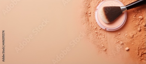 Foto Close up of a brush applying beige powder emphasizing a nude makeup look on a is