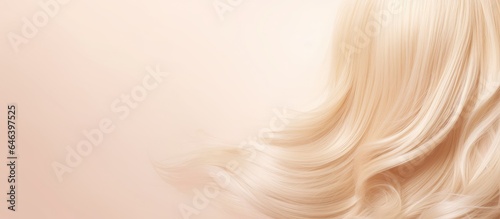 Blond hair captured in isolated pastel background Copy space