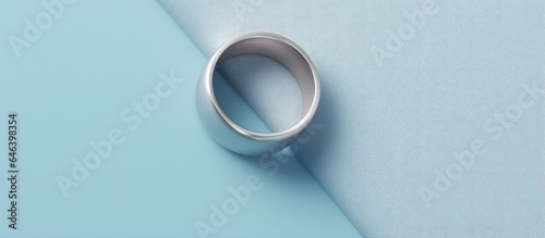 Blue ring with silver isolated on a isolated pastel background Copy space