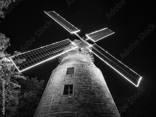 The old windmill at night in Germany