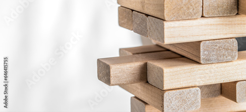 Wooden block balancing tower. Business strategy  insurance and planning concepts.