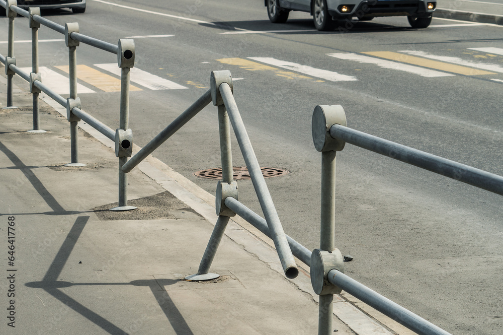 Damaged road fence as a result of a traffic accident Damaged road fence as a result of a traffic accident