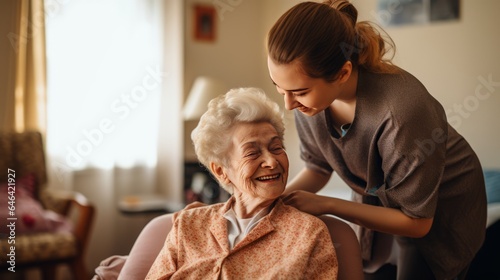 An elderly person happy to be cared for by a caregiver photo