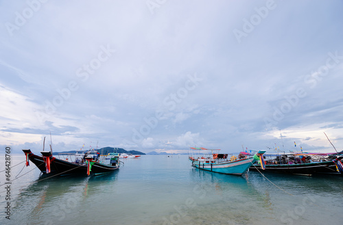 Beautiful landscape with traditional longtail boat on the beach. Samui, Thailand.
