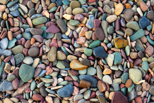 Colorful stones on the shore of Waterton Lake in Waterton Lakes National Park