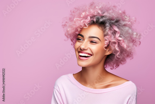 A Woman With Pink Hair Smiling And Wearing A Pink Shirt