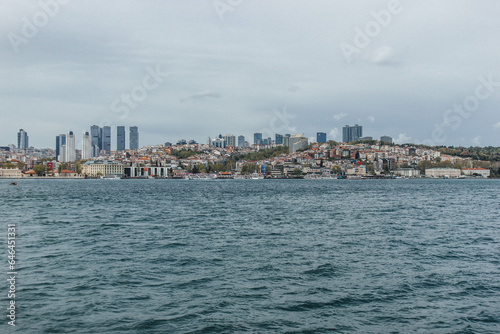 View of bosphorus strait water at mid day with beautiful light and bridge with skyline © Radu
