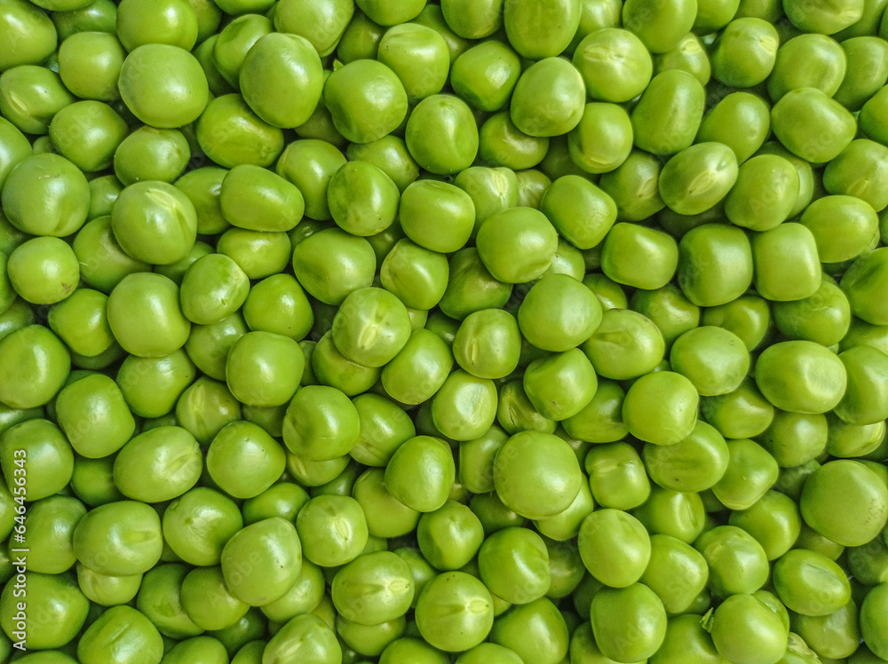 Fresh green peas close-up as a background Fresh green peas close-up as a background