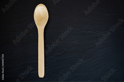 Wooden Spoon on black background