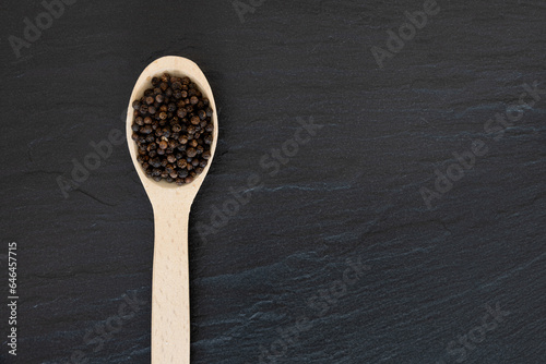 Black Pepper on a wooden spoon