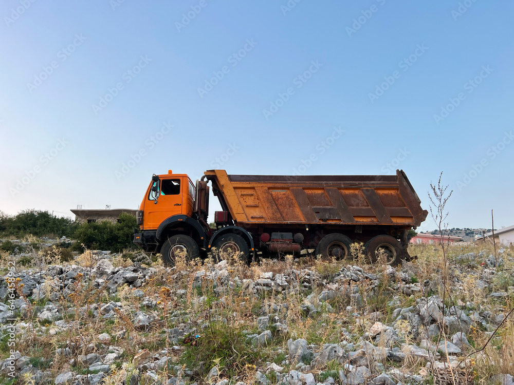 Rural Tranquility: Hopper Truck on a Sunny Summer Day Rural Tranquility: Hopper Truck on a Sunny Summer Day