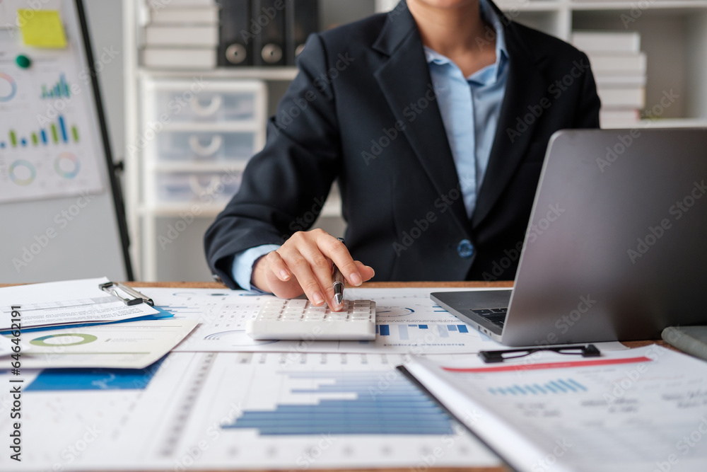 Businessman sitting with laptop and working with growing graph. Business data analytics concept. Businessman sitting with laptop and working with growing graph. Business data analytics concept.