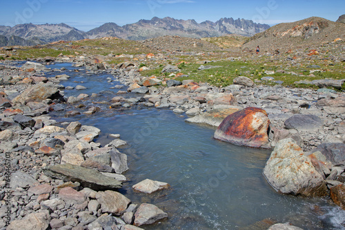 A creek runs through the rocks at Lac de la Fare photo