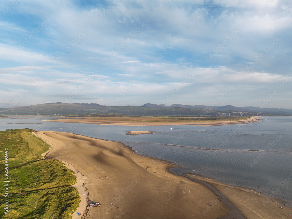 Sandy beach with blue skies and sea, sandy shore Sandy beach with blue skies and sea, sandy shore