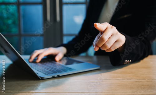 close up hands multitasking man using tablet, laptop and cellphone connecting wifi