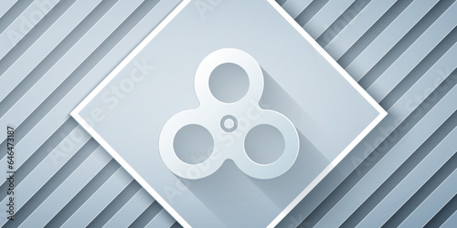 Paper cut Fidget spinner icon isolated on grey background. Stress relieving toy. Trendy hand spinner. Paper art style. Vector