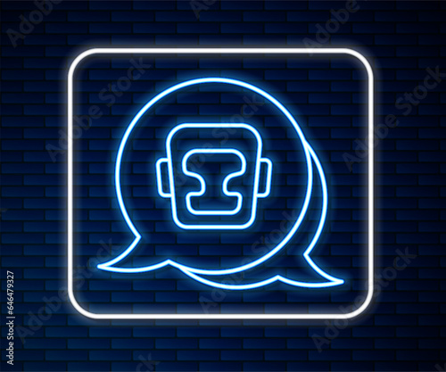 Glowing neon line Boxing helmet icon isolated on brick wall background. Vector
