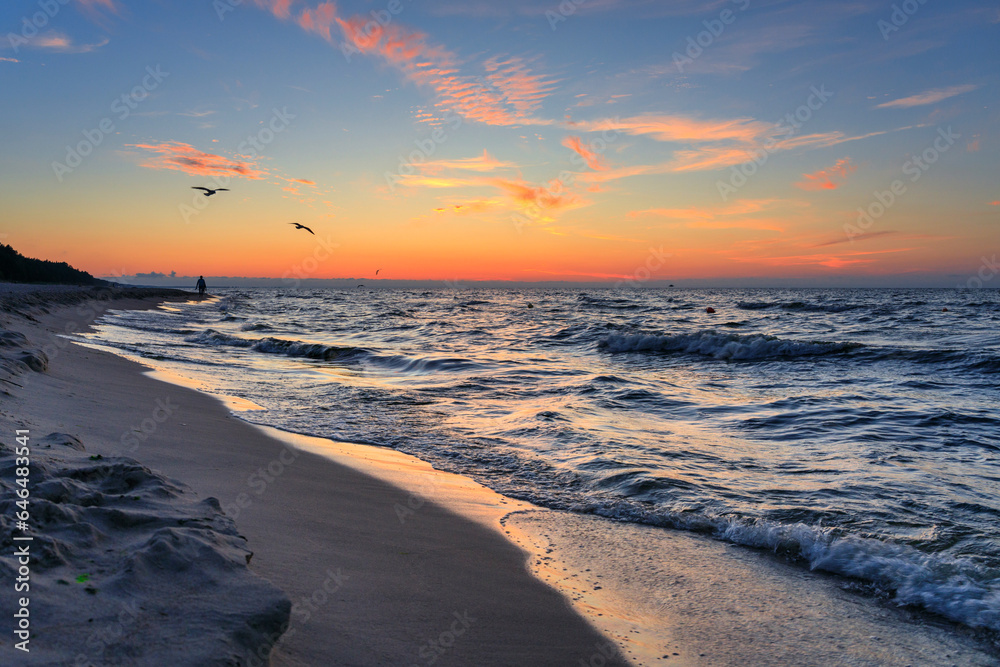 Beach of the Baltic Sea in Sztutowo at sunset, Poland
