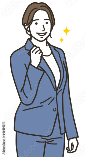 ガッツポーズをする女性のビジネスパーソン
