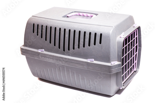 Pet carrier. Plastic carrying case for traveling with pets or visiting veterinarian. Animal transportation box or kennel.