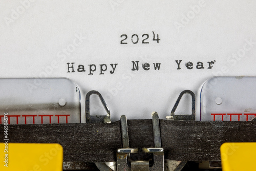 Happy New Year 2024 written on an old typewriter	
