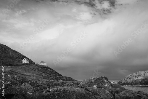 Cloudy Summer Morning at Krakenes Lighthouse Beach in Måløy: Black and White Landscape