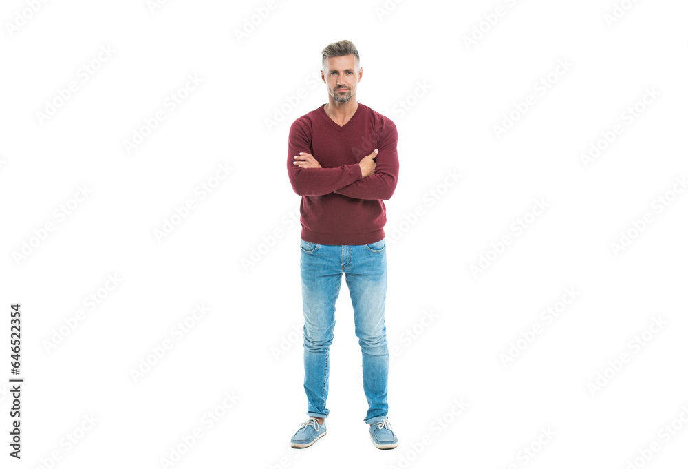 An attractive man with trendy hair and clothes isolated on white. A handsome man posing in a trendy studio. handsome mature man with trendy hairstyle wears casual sweater. trendy caucasian man