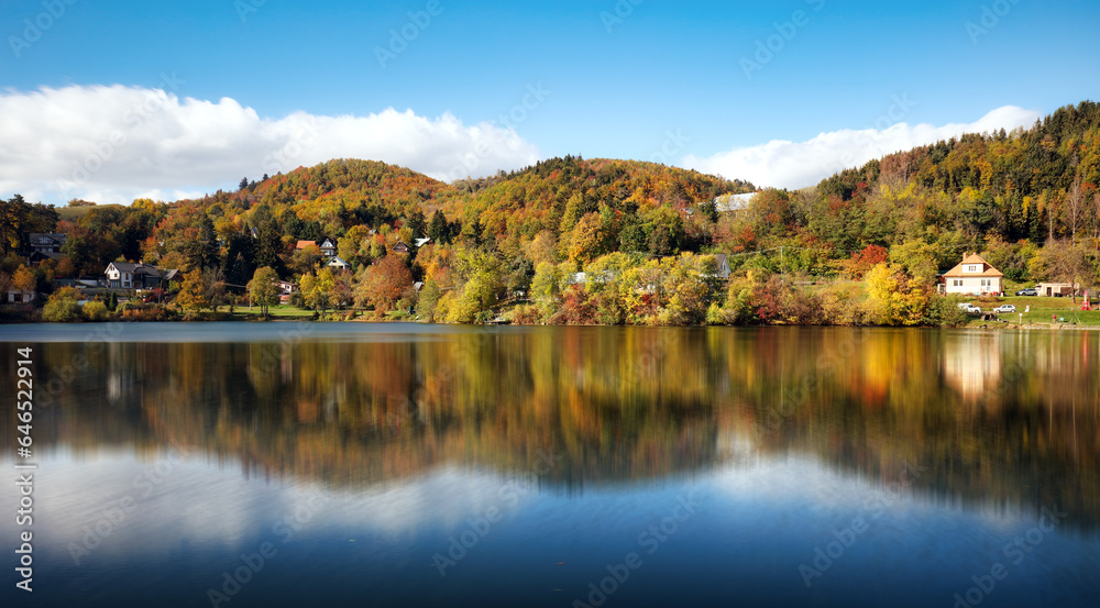 Lake with autumn forest reflection in water, Slovakia - Tajch Vindsachtsky